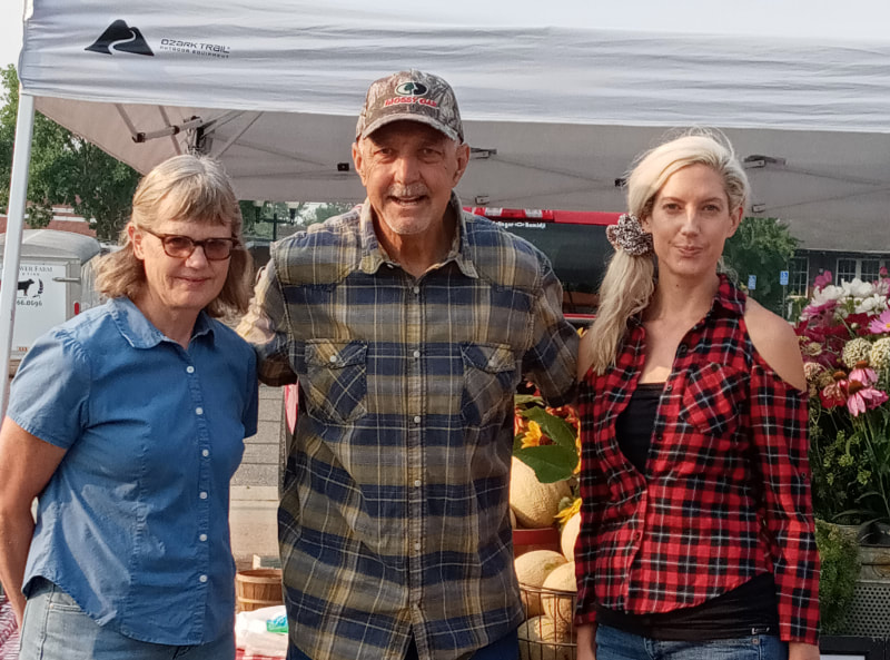 Jacki, Jeff and Danielle Molnar at the Farmers Market